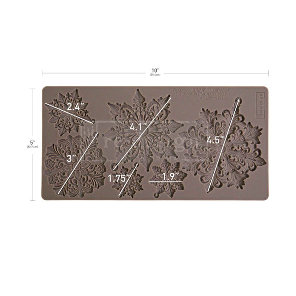 Silicone mold with floral designs and measurements on a white background