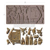 Silicone mold with nativity scene figures and dimensions on a white background