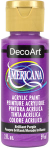 Purple bottle of DecoArt Americana acrylic paint with gold cap
