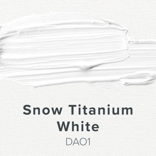 Close-up of Snow Titanium White paint swatch on a textured white background
