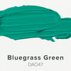 Smooshed green color swatch labeled 'Bluegrass Green' with code DAO47 on a white background