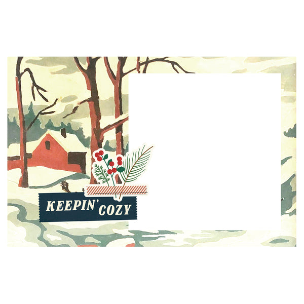Illustration of a cabin in the woods with 'Keepin' Cozy' text on a snowy landscape.
