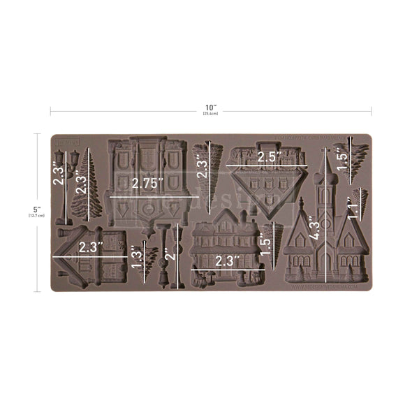 Chocolate mold with architectural shapes and measurements on a white background
