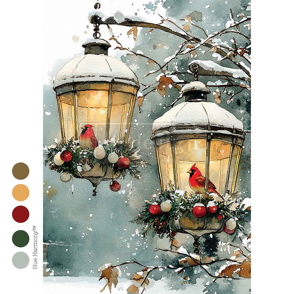 Two snow-covered lanterns with red birds and ornaments against a snowy background