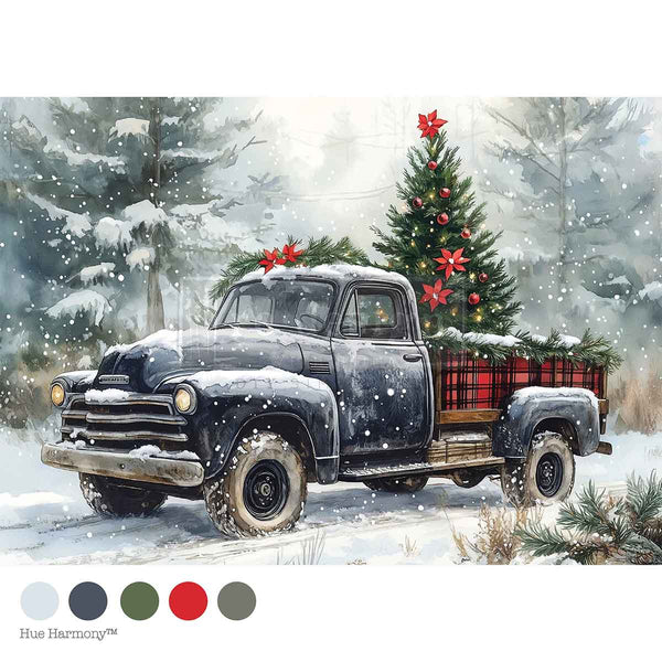 Vintage truck with Christmas tree in a snowy landscape
