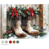 Pair of rustic cowboy boots with plaid pattern, surrounded by Christmas decorations on a wooden background.