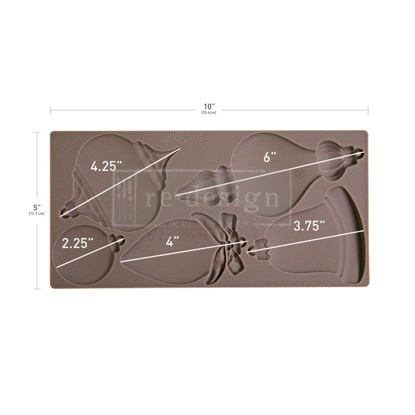 Silicone mold with bow designs and measurements on a white background