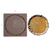 mold with scalloped edge and a sample product on a white background