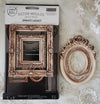 Decorative mold packaging with ornate design on a textured surface
