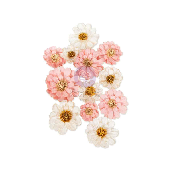 Set of pink and white artificial flowers on a white background