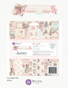 Prima Marketing Inc. 'Christmas Blush' 6x6 paper pad packaging, featuring a pastel pink and cream design with illustrations of teddy bears, Christmas trees, and vintage motifs.