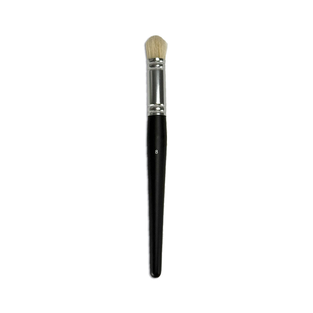brush with black handle and silver ferrule on a white background