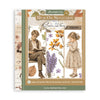 Stamperia Rub On Selection 'Flowers and Poems' transfer film sheet, featuring vintage illustrations of a man reading and a girl holding flowers, with lavender, orange flowers, and autumn leaves on a beige and green patterned background.
