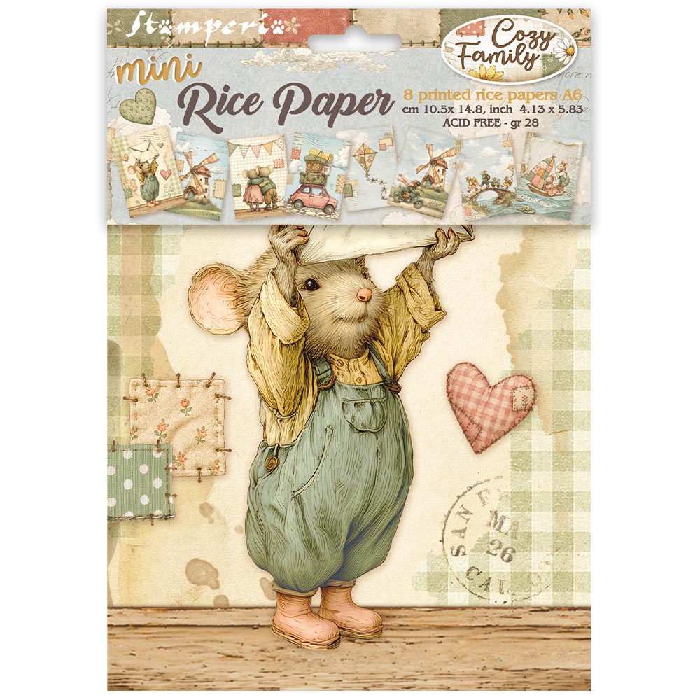 A package of 'mini Rice Paper' by 'Cozy Family' featuring a vintage-style illustration of a small mouse in green overalls and a yellow shirt, holding a hat above its head. The packaging includes a header card with illustrations of other stamping papers and product details.