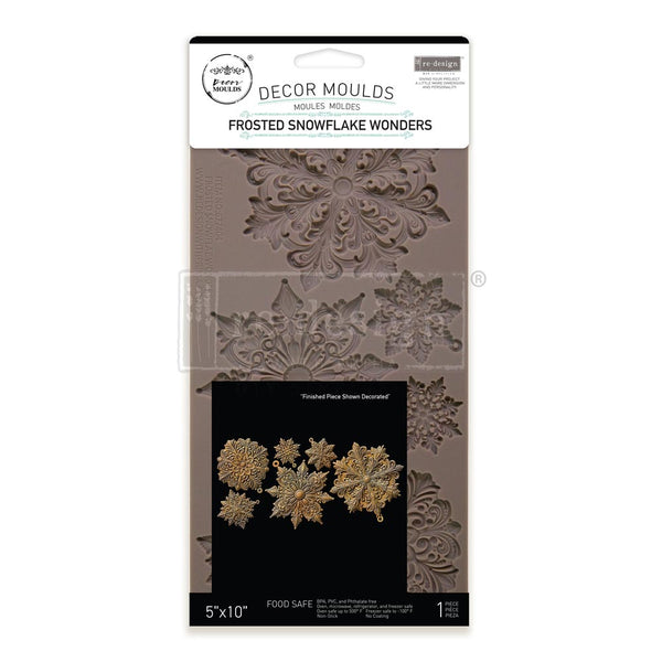 Decor moulds packaging with decorative snowflake designs on a white background