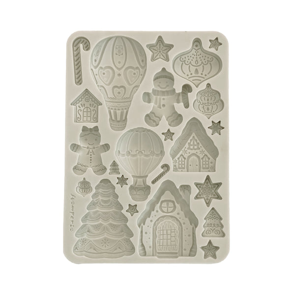 Silicone mold with various shapes on a beige background