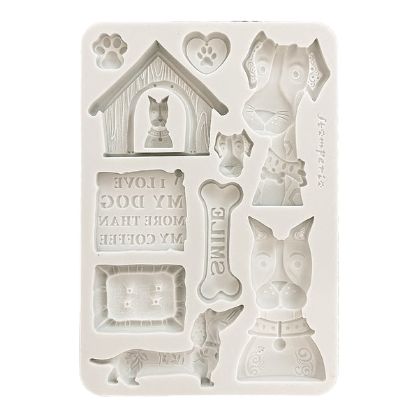 Set of dog-themed silicone molds on a white background