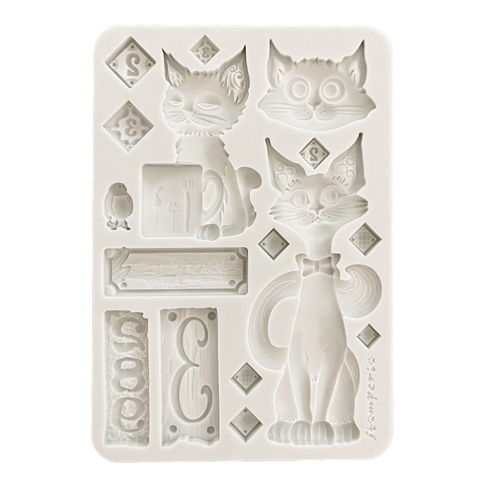 Silicone mold with cat designs on a white background