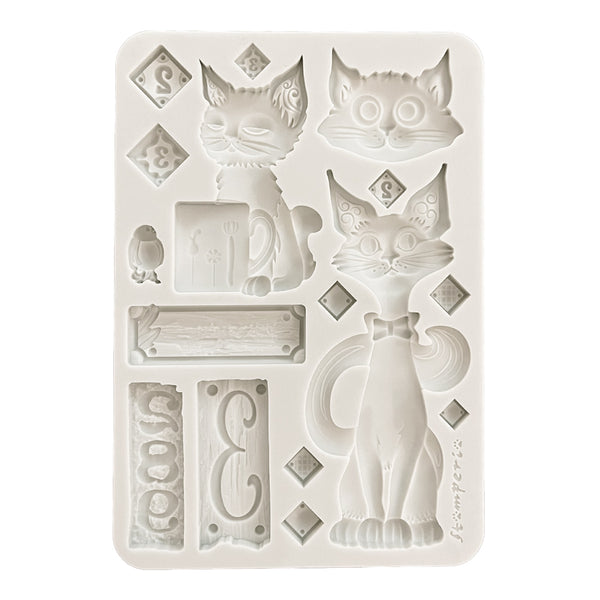 Silicone mold with cat designs on a white background