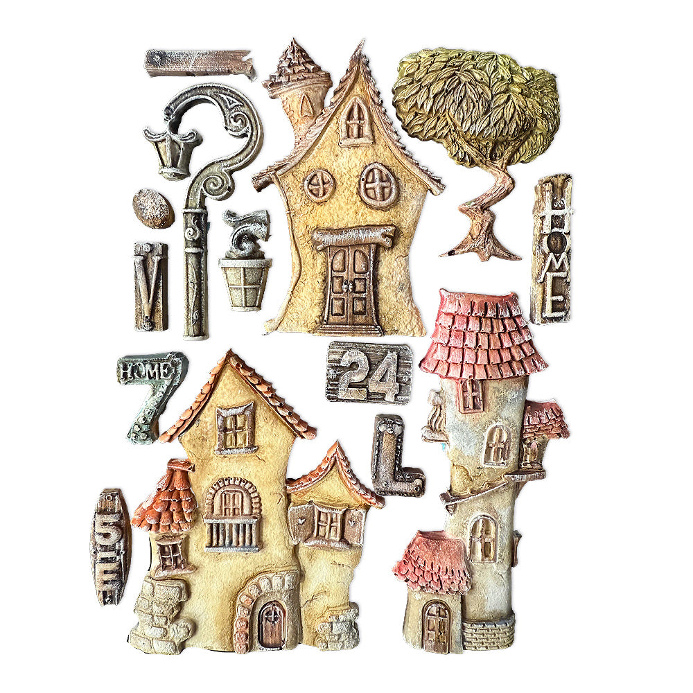 Set of decorative miniature houses and accessories on a white background