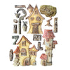 Set of decorative miniature houses and accessories on a white background