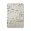 Decorative silicone mold with intricate designs on a white background