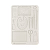Decorative mold with artistic tools on a white background