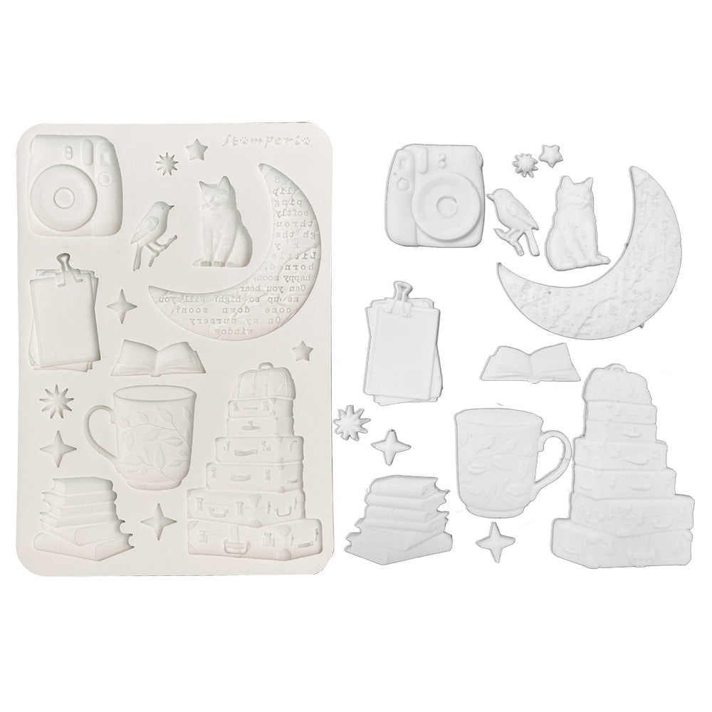Set of white silicone mold shapes on a white background