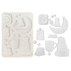 Set of white silicone mold shapes on a white background