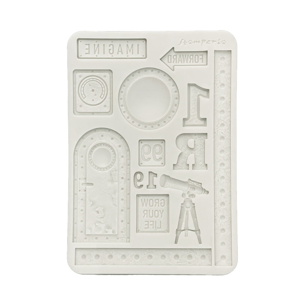 Silicone mold with various shapes and text on a white background