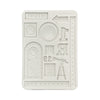 Silicone mold with various shapes and text on a white background