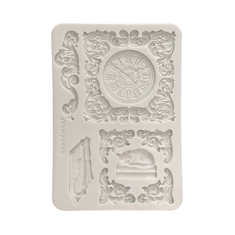 Decorative silicone mold with clock design on a white background