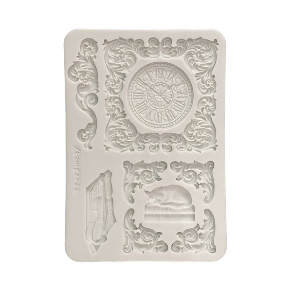 Decorative silicone mold with clock design on a white background