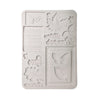 A white silicone mold with multiple embossed autumn-themed designs, including maple leaves, oak leaves, butterflies, and decorative text, shown on a plain white background.