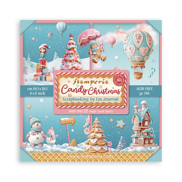 Scrapbooking album cover with candy-themed design featuring hot air balloons, gingerbread men, and Christmas trees on a blue background.