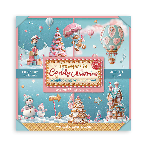 Scrapbooking paper pad with candy-themed Christmas design on a blue background
