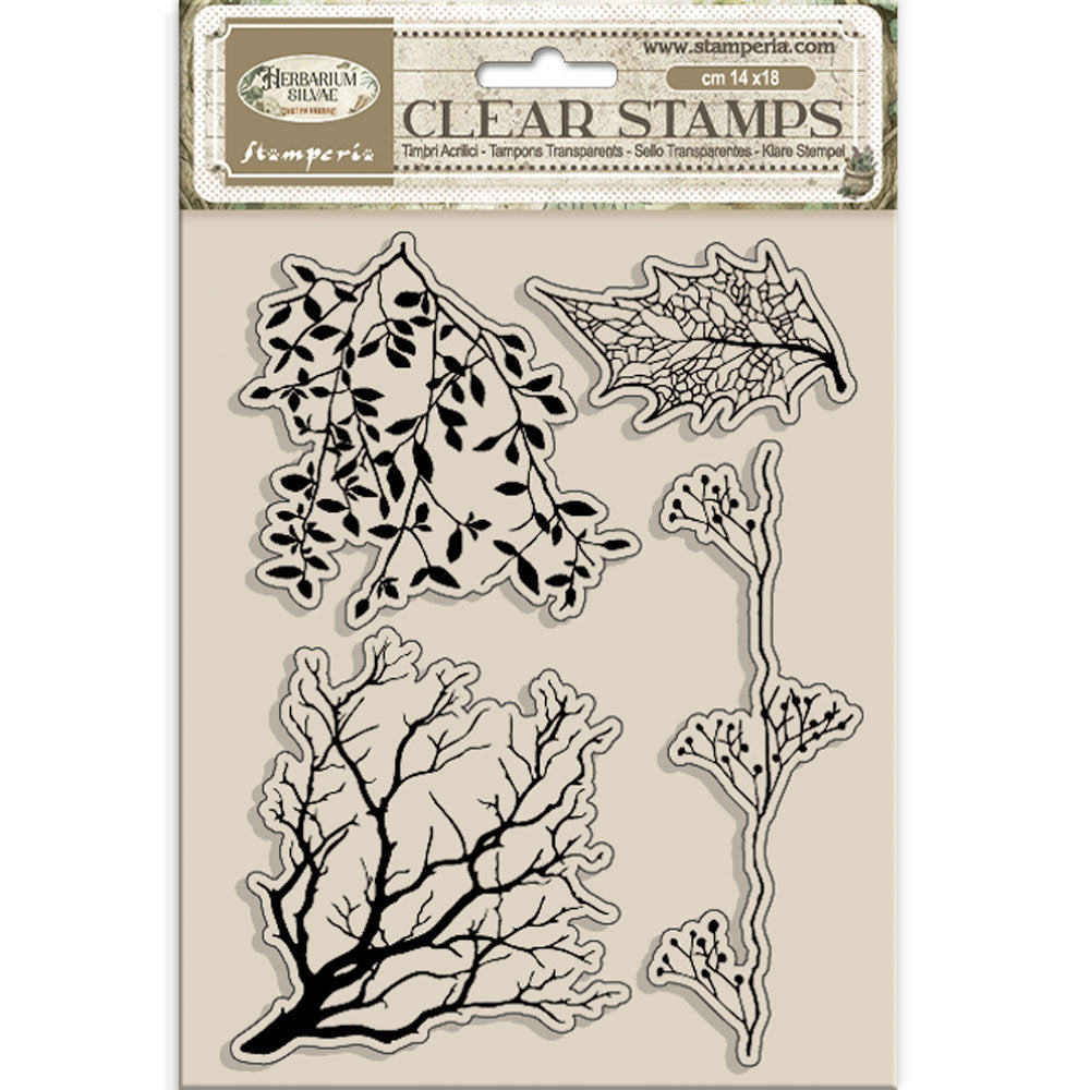 Clear stamps with leaf and branch designs on a beige background