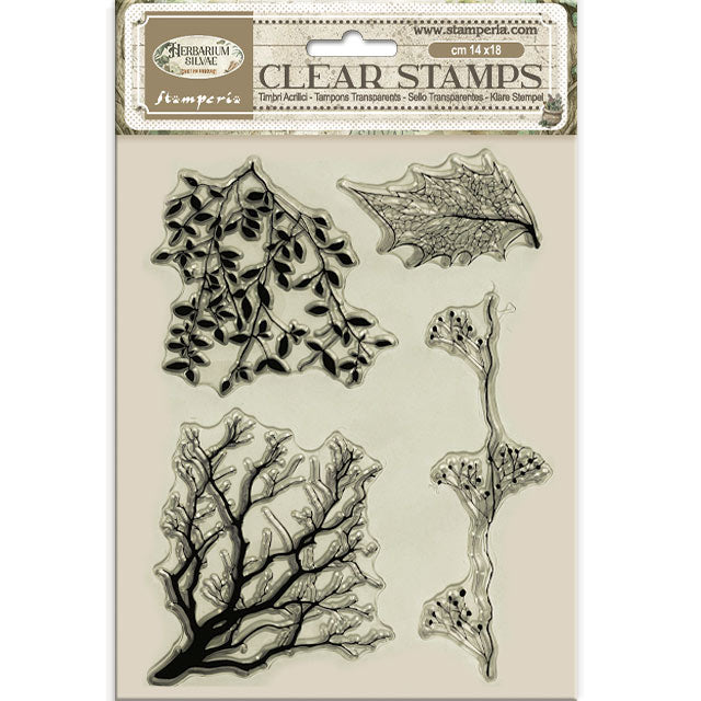Clear stamps with leaf designs on a beige background
