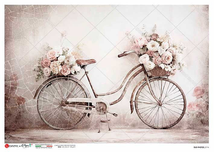 Vintage bicycle with floral decorations on a textured background