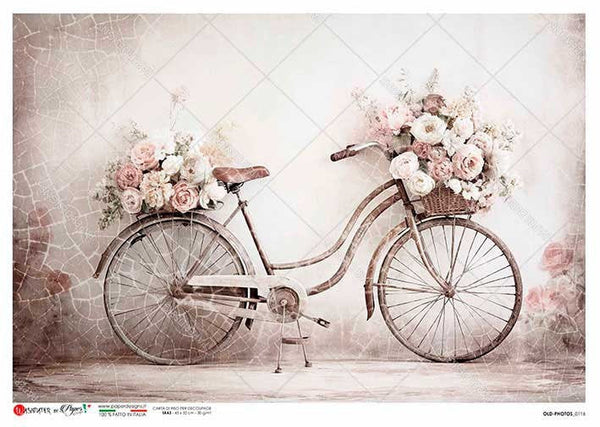 Vintage bicycle with floral decorations on a textured background